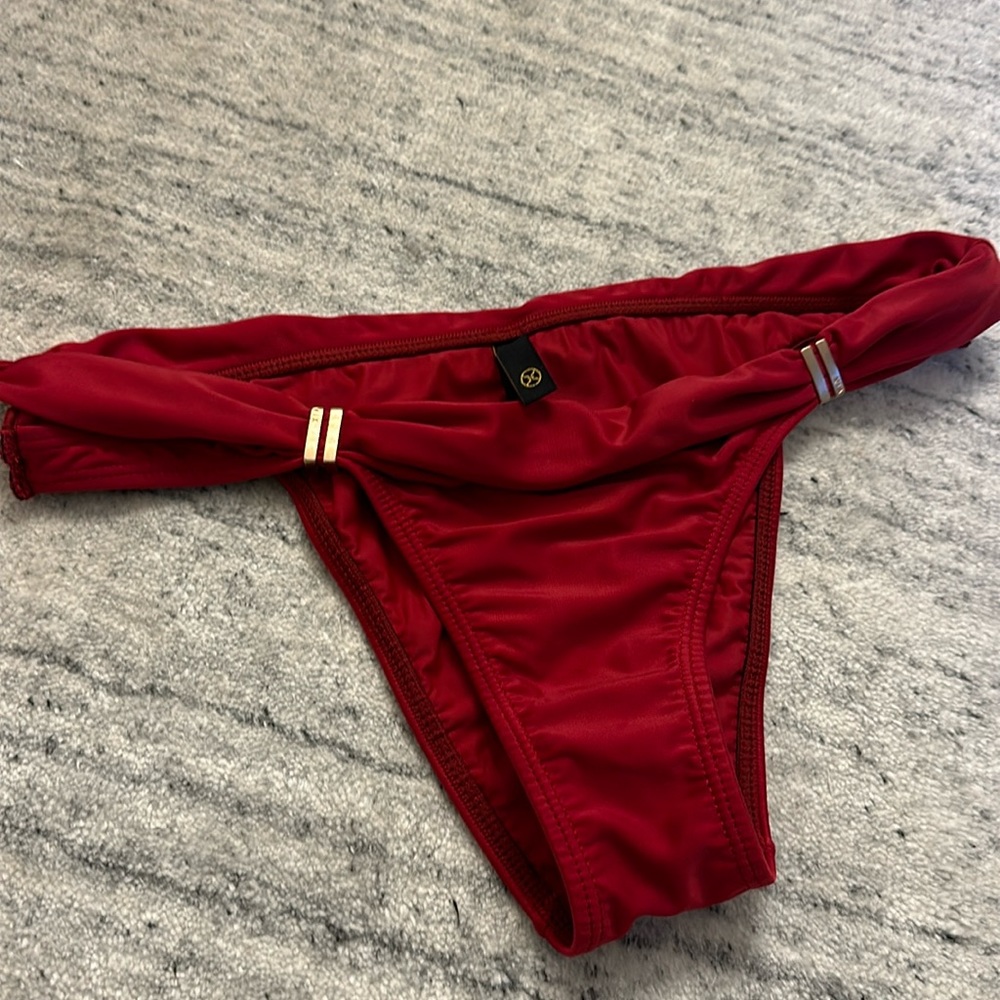 Gorgoeus vix bikini bottom.  Never worn. Size medium. Deep red